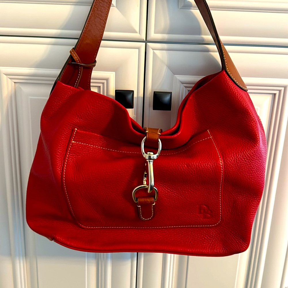 Dooney and Bourke Signature logo lock bag. Used for one weekend